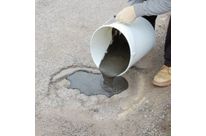 Straßenreparatur - Loch im Betonboden