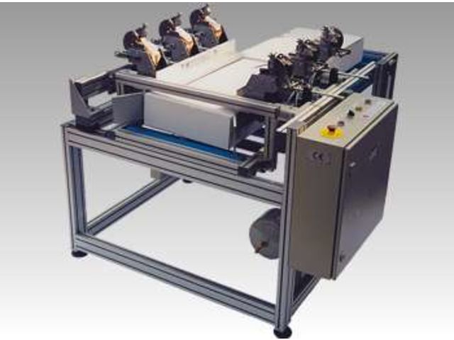 Heftautomat fuer den Boden- und Deckelverschluss