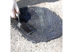 Asphalt-Füller Giessmasse Schwarz - Schlagloch im Asphalt 